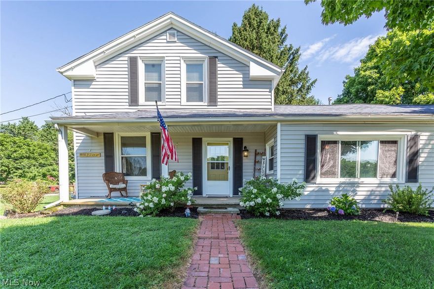 A charming and renovated 1900's farmhouse with 4 bedrooms and one full bath. The large kitchen has been renovated with new paint, fixtures, island and built-in seating. New (July 2018) vinyl flooring and carpet throughout the first floor. First-floor master bedroom boasts a large walk-in closet. Upstairs you'll find three large bedrooms, but these rooms could easily be transformed to meet your family's needs. Find yourself surrounded by an apple orchard on over a half an acre.