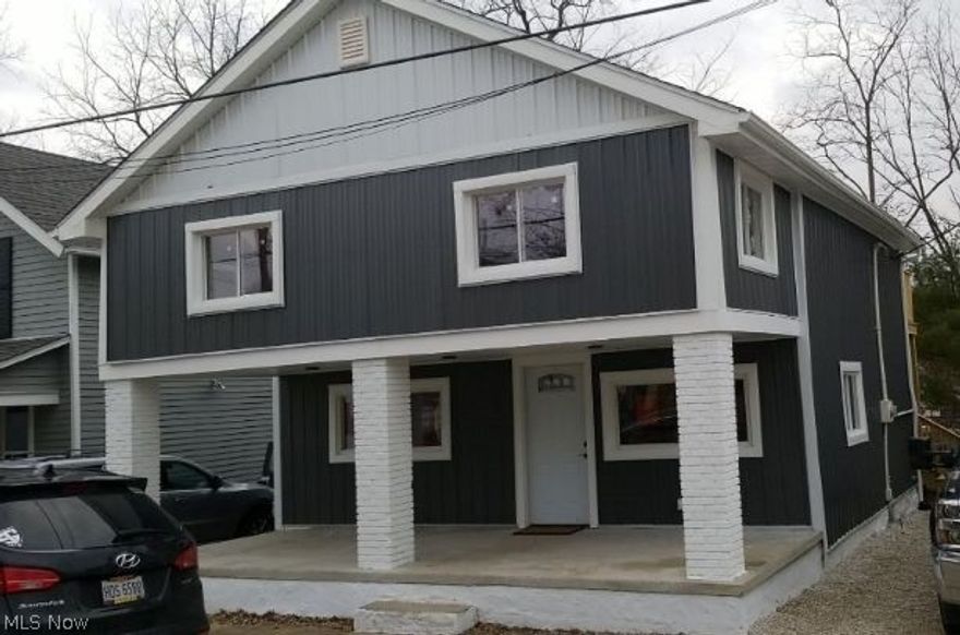 Hurry Come see this beautifully redone home in the heart of Garrettsville. Huge Greatroom with lifeproof laminate flooring. A Modern kitchen with stainless steel appliances. Two newer 16 x 8 decks with a great views of silver creek. Plus an all electric ventless heat pump for economic heating and cooling. Only yards away from the Cellar Door coffee house.