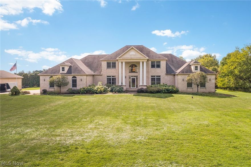 Magnificent 4 bedroom, 6 bathroom custom built home sits on a sprawling 4.85 acres featuring a 2400 Sq. ft detached garage.  This home offers oversized rooms with windows throughout offering beautiful views of the property.  Large kitchen features center island, walk-in pantry, stainless steel appliances and an abundance of counter & cabinet space. Two story great room opens from the kitchen with a wall of windows and fireplace. Nicely sized formal dining and living room open to great room making it perfect for entertaining. Two master bedrooms, each with full bathrooms and walk in closets offers opportunity for an in law suite, large private office and laundry finish the first floor. Second level features 2 additional bedrooms with own private bath and walk in closets. 13 course basement with extra wide stairs features a fully finished bathroom and access from the 3-car garage. Horseshoe driveway has oversized RV or boat parking areas. Any car enthusiast, shop tinkerer or contractor w