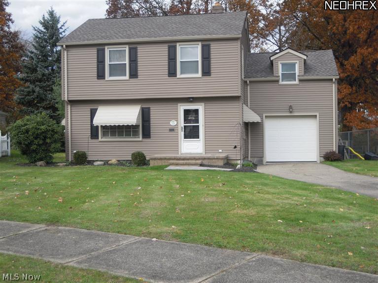 Wooden storage shed, small creek to rear of lot. Newer Roof and siding/2-3 years. New custom stone front porch. Close to shopping, Mill Creek Park, schools and 10 minutes from highway access.