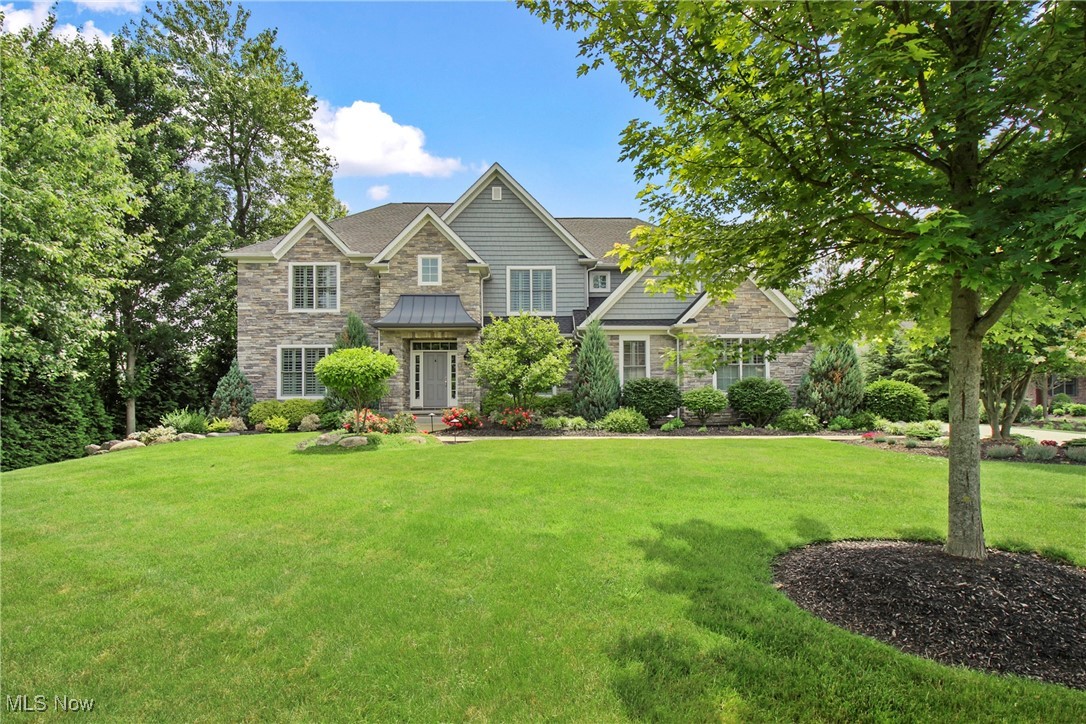 Located on a quiet cul-de-sac, this extraordinary custom home offers a thoughtful layout and high-end finishes throughout. A dramatic two-story foyer leads to a bright great room and a chef’s kitchen with custom cabinetry, a walk-in pantry, and a large center island. A first-floor office or guest suite sits next to a full bath, offering flexibility for today’s lifestyle. Upstairs, all four bedrooms include walk-in closets, including the spacious primary suite with a luxurious bath. The finished lower level adds over 1,600 square feet of additional living space with dedicated areas for work, play, and fitness. Outside, a brick patio with built-in fire pit overlooks a beautifully landscaped yard with plenty of space and privacy.
Enjoy a prime Westlake location just minutes from Crocker Park, upscale dining, the rec center, golf courses, and major highways. Nearby, Bradley Road Reservation offers trails, picnic areas, and playgrounds—perfect for outdoor enthusiasts. Located in the award-winning Westlake school district, this is truly a rare opportunity.