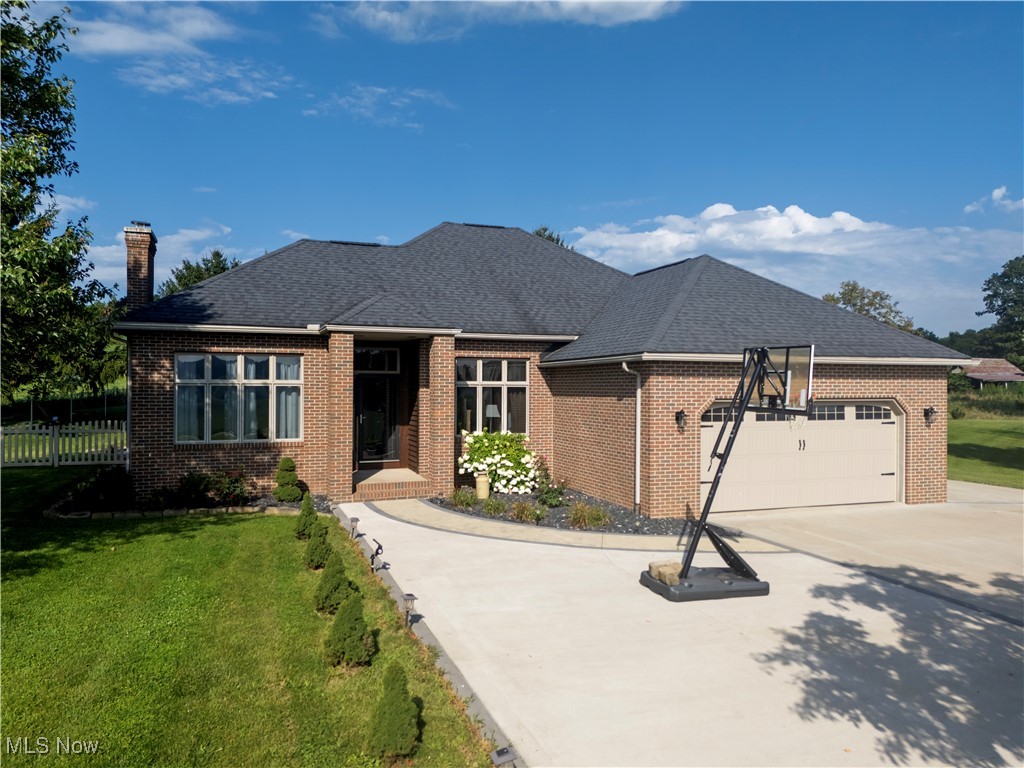 Welcome to this beautifully updated brick ranch home located on 4 serene acres with some of the best views in Wayne County! Whether you're enjoying a quiet morning or entertaining guests, the stunning stamped concrete covered patio is the perfect place to take it all in. Additional outdoor amenities include a fenced back yard area, updated landscaping, multiple storage sheds, expanded concrete parking, and Generac Generator for peach of mind.
Inside, you'll find a gorgeous, fully renovated kitchen featuring light cabinetry, striking quartzite countertops, a stylish tile backsplash, and newer appliances—ideal for both daily living and hosting.
The lower level provides expanded living space, including a cozy family room, a dedicated kids’ playroom, and abundant storage options—perfect for a growing family or weekend guests.
Some Additional highlights include, newer flooring and fresh paint, garage and patio doors and much more!
This is a rare opportunity to own a move-in ready home on acreage only a few minutes from town with both modern amenities and timeless charm. Don’t miss your chance—schedule your private showing today!