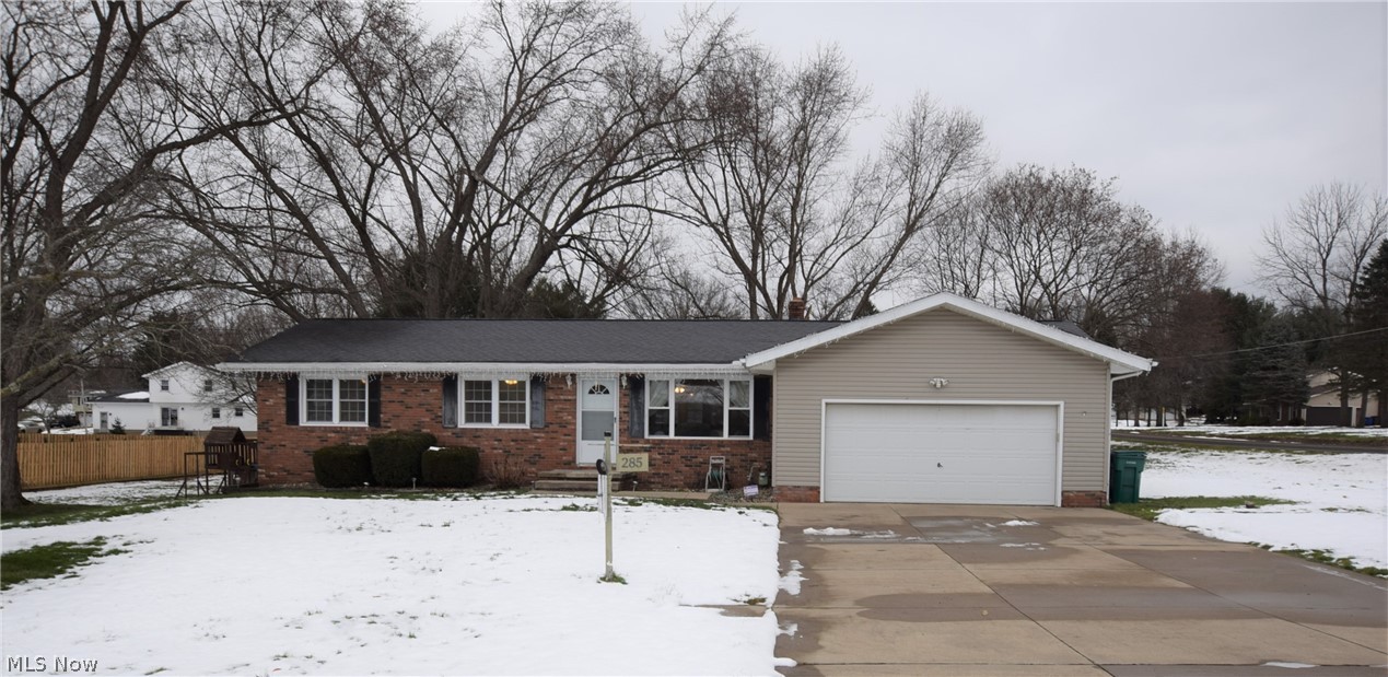 Welcome home to 285 Vesper Road! This beautiful, move-in-ready, ranch is nestled in Mogadore. As you step inside, you are greeted by a bright and airy feel that the picture window provides the family room. The convenient one-floor living offers a great flow, including three bedrooms and an updated bathroom. Off the kitchen, find a bonus room which could be used as a den, mudroom, office or playroom. The expansive finished basement provides plenty of room to gather! The amazing features do not end there. The exterior boasts a beautiful lot, large concrete drive and vinyl siding complimented by a brick front. Don't miss your opportunity to call this gem “home” and schedule a private showing today!