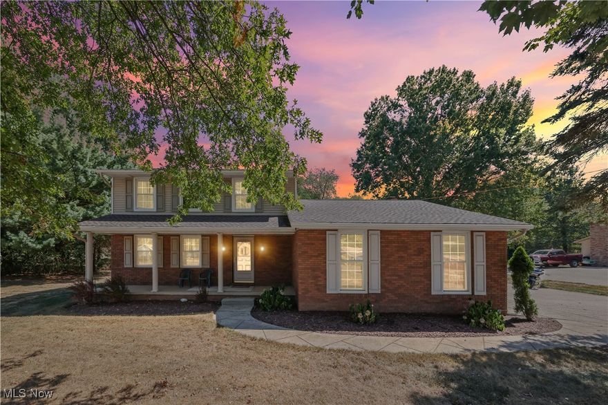 Welcome to this lovingly cared for home situated on over an acre in Field Local School district! You will find the old adage true, location, location, location!  This 3 Bedroom, 3.5 Bath home is ready for you to make it your own and enjoy the perfect blend of comfort, space, and rural living.  Entering from the two car attached garage you can enjoy a fire in the family room with a view of the back porch and expansive back yard.  Custom hardwood flooring on the main level leads you up to 3 bedrooms and primary/guest bathrooms.  A partially finished basement with full bath, laundry, utility, storage, and a brand new updated panel await.  Just minutes from downtown Mogadore and the highway, this home will sell fast so please schedule a tour with your Realtor today!