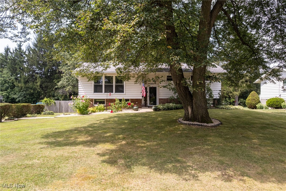 Completely remodeled inside, this 1,860 sq/ft split-level home in Wadsworth offers stylish comfort and a convenient location close to parks, schools, shopping, restaurants, highway access, and more! The open floor plan on the main level creates an inviting space for everyday living and entertaining. The fully applianced kitchen features modern finishes, while the master bedroom on the lower level offers privacy with slider doors leading to the screened-in porch. Also on the lower level are a dedicated office and laundry room for added convenience. Updates include new flooring throughout (2020), all new doors, and a beautifully remodeled upstairs bath (2025). The patio—added in 2021—extends from the screened-in porch and includes a pergola that stays. The backyard is your own oasis with strawberry and vegetable gardens. An attached 2-car garage completes this move-in-ready home. Schedule your private showing before it's too late!