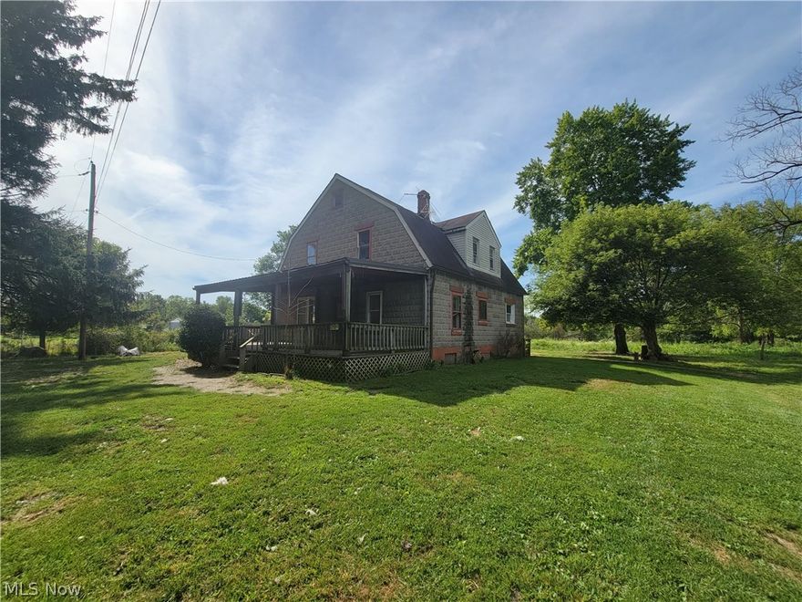 BANK owned!! Excellent investors opportunity to purchase this mini farm located on 3.03 acres! This home does need TLC but will be well worth your investment! Great rural location with tons of possibilities! This would be the perfect home to turn into the "farmhouse" style that everyone loves! Lots of space with bright and open rooms! There's a first floor bedroom/office and 4 additional bedrooms on the second story. Lots of space to add another bathroom on the second level if you wanted. Spacious covered front porch, cool brick wall in the kitchen with plenty of space to make a breakfast bar.  It does appear to have laundry hookup within the kitchen but could be moved into the 1st floor bonus room.  All offers must be accompanied by a minimum earnest deposit of 2% of the gross sales price or a minimum of $1000. There's also an outbuilding on the property that would be perfect for horses, cows or any kind of livestock. Lots to do here, just bring your imagination! Selling AS-IS.