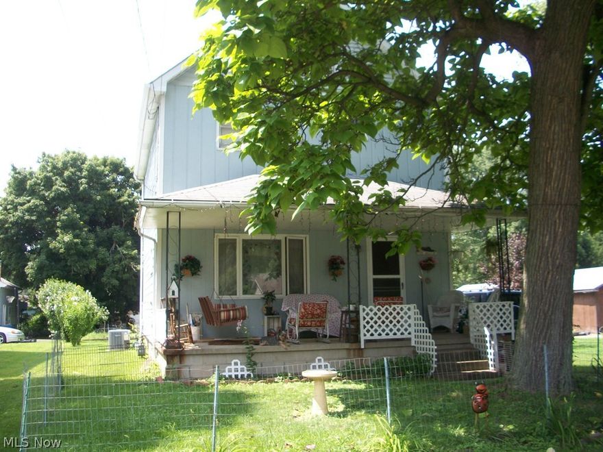 Nice older home with Lots of Potential.  Large Living room, Dining room and Kitchen with open floor plan.  Kit appliances stay (Dishwasher not working)  Paritally finished basement with Bar, Shower, Toilet and Sink just need walls!  3 Bedrooms on 2nd floor, hardwood under carpet on 2nd floor. Large bathroom, unfinished attic could be possible 4th bedroom or bonus room. Large 2 car garage w/unfinished floor.  Roof '98, Furnace / A/C 2011, Siding 2011