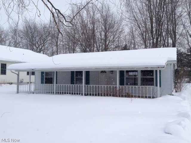 Ranch style home with a big porch and nice yard. Home has a bright and spacious living area with a fireplace, a kitchen with ample storage space, built-in storage and more!