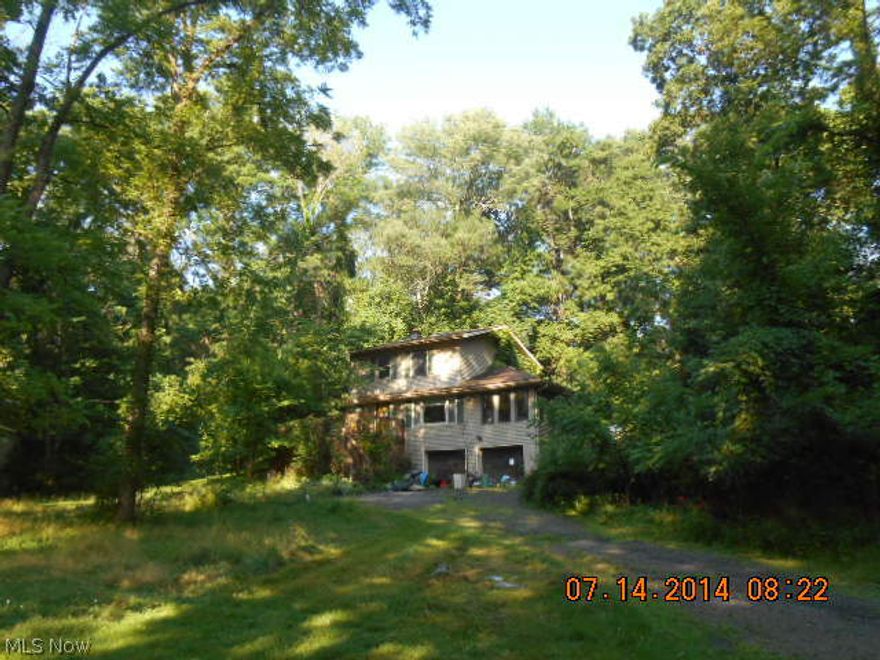 Quiet and peaceful setting for this 3 bedroom, 1 bathroom colonial set back from the road with 1.16 acres of land. Hardwood floors on first floor. Large family room overlooks the rear deck. Full basement. Attached 2 car garage. Outbuildings.  This property is to be included in an upcoming auction. Auction to begin 3/6/15 and end 3/13/15.