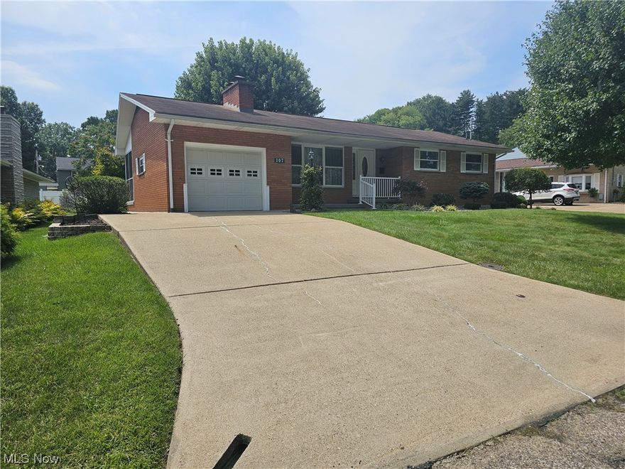 Move-in ready, neat and clean 3 bed 2 -1/2 bath brick ranch with a ton of natural lighting in one of the nicest No Parkersburg areas. Quiet and peaceful setting.  If you need storage, this is the home for you!  Closets are everywhere, not to mention the basement. This home has many updates including fresh neutral paint throughout, some new flooring, a new primary bath (except the shower),  new lighting, new 200 amp service, newly constructed stairs to the basement, all new bright lighting in basement areas, new front porch carpeting to name a few.
Currently, the laundry is in a very bright and clean basement.  It could easily be placed on the main level in one of the 2 large primary bedroom closets centrally located to the kitchen and bedrooms.  If you prefer a large eat-in kitchen but need dining space as well, the Dining Room could easily be located on the opposite end of the living room.  The basement level leaves many opportunities for more living space including a fireplace and w