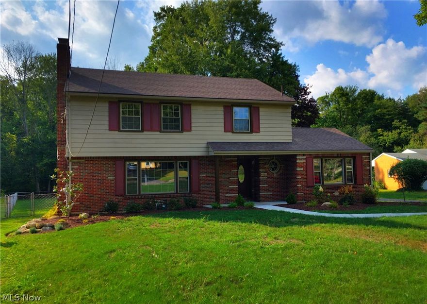 MILL CREEK PARK HIKE & BIKE TRAIL IN YOUR BACK YARD!!  This home is totally Renovated and it is AMAZING! Quality throughout. You will be WOWED by the spacious rooms and amount of closet and storage, updated decor, granite counter tops, beautiful flooring and much more.The large updated kitchen has all appliances, snack bar, recessed lighting & is open to the dining room. Very Large living room with a beautiful gas fireplace. Off the dining room are french doors leading to the office and sun room. Also on the 1st floor is a large family room that could also be a 1st floor bedroom and a 1/2 bath done in lime stone tile. The Oak staircase leads to 3 bedrooms & full ceramic bath. The basement is finished with a large rec room with a big brick & stone gas fireplace as well as a full bath. Updates include New Roof, gutters, driveway, garage floor, windows, garage door with opener, lighting in & out with striking lamppost, doors in & out, locks and hardware, landscaping, yard, window wells, g