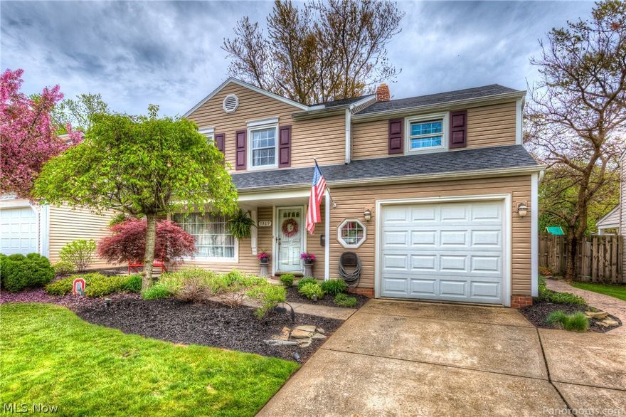 Gorgeous 3 bedroom 2 full bath colonial is absolutely house beautiful!  Neutrally decorated and immaculate! Bright and airy living room with wall of windows! Formal dining room with hardwood floor and built in cabinet. Lovely kitchen features tile back splash and floor, stainless steel appliances and lots of cabinet space. Three generous sized bedrooms. Both full bathrooms have been completely re done.  Convenient first floor laundry room with utility sink and cabinets. Enormous family room features brick fireplace and french doors out to the amazing outdoor oasis! So many entertaining areas outside, including a deck, a stamped concrete patio and a built-in fire pit, as well as a storage shed, all surrounded by a privacy fence! This impeccably maintained house is truly move in ready!