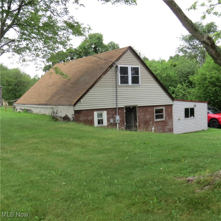 Southeastern Carroll County 1.886 Acre Property with Home, 2- Car Detached Block Garage, and 2006 24'x40' Pole Garage! INCOME PRODUCING MINERALS INCLUDED! 1982 1 1/2 story dwelling with kitchen, living room, office area, full bath, single bedroom, and space in the upper level for more bedrooms. The upper level is currently accessed from the exterior as the stairwell was removed but could be replaced. New mini split heating and cooling system installed in 2023. Also, a 12'x32' enclosed porch with metal roof, good 22'x24' 2-car garage, and nice 24'x40' with overhead doors. Both outbuildings have 220v electric and door openers. Building was previously used for mechanical work. There's a good wooden 10'x16' storage shed included as well. Property has spring water, and a new septic system to be installed. An easily accessible property that lays fairly level and has room for a garden, horse, etc. NO ZONING! Call to schedule your viewing or with questions!