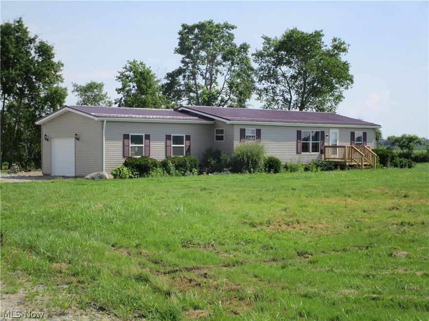 Property is taxed as Real Estate & has a full basement. There is a new metal roof & a new front porch.