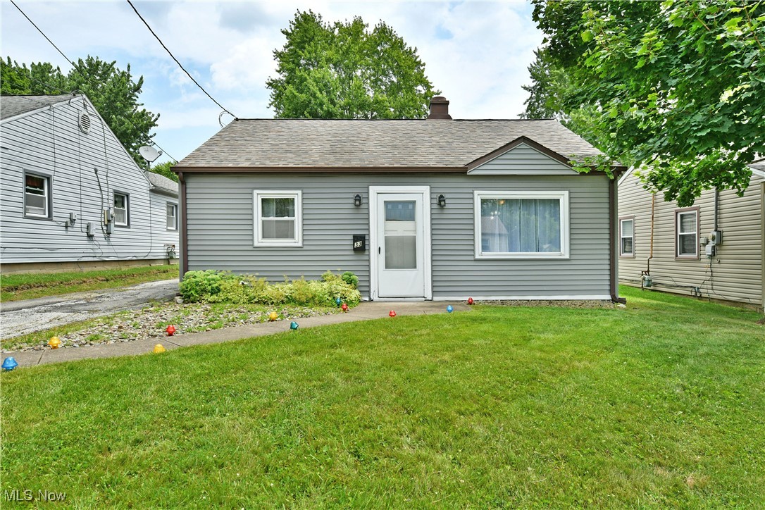 The perfect fit! Snuggle up and get cozy in this charming Niles home that blends comfort, style, and functionality. With a spacious two-bedroom layout plus two versatile bonus rooms, this move-in-ready gem offers all the space you’ve been looking for, wrapped in an efficient and inviting package. Nestled in a quiet neighborhood, the property sits on a nice lot that extends back to a detached two-car garage, an excellent bonus for storage or parking. The gray and white exterior adds instant curb appeal, while a concrete sidewalk leads to the welcoming front entrance. Inside, neutral tones carry throughout as natural light fills the sun-drenched living room, thanks to a large picture window. Plush carpeting leads down the hall to a beautifully updated full bathroom, flanked by two equally well-appointed bedrooms, each with stylish finishes and personal closet space. Just off the living room, the deep galley-style kitchen delivers on both looks and functionality with rich wood trim, ample cabinetry, stone-look countertops, and generous storage. A cozy eat-in dining space anchors the far end. The two versatile bonus rooms are found at the back of the home, ideal for a home office, guest space, or additional bedrooms as needed, along with a tucked-away laundry/utility room for added convenience. This home also comes with a one-year home warranty.