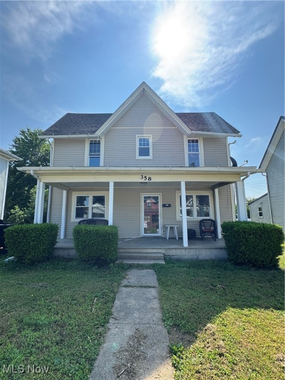 Beautifully updated 4-bedroom, 2 full bath home with modern finishes throughout. Features include main floor laundry, newer windows, a covered front porch, off-street parking, and a spacious backyard with a storage shed. Move-in ready and full of charm.