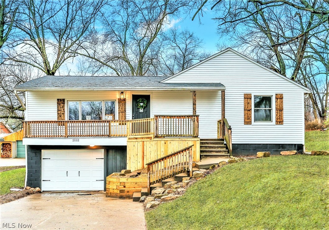 ** Stunning One Floor Masterpiece ~ This FULLY Remodeled Ranch Is A Showstopper! *1300+ Sq. Ft W/3 Bdrms, 2 FULL Bathrms, Attached 1.5 Car Garage & 1.2 Acres Of Land! *Impress Your Guests From The Moment They Walk In With A New Open Floor Plan Layout! *Updates Include: Brand NEW Architectural ROOF, VINYL SIDING & Almost All NEW WINDOWS! *LUXURY Plank Flooring And Reclaimed Shaw Carpet Throughout! *Walk In To A Fully SHIPLAPPED Living Rm, Dining AND Kitchen! *Eat In Kitchen W/Custom Brown Rustic Wood Accent Ceiling, New Fresh White Shaker Arcadia Style CABINETS, Butcher Block COUNTERTOPS And Custom Large Center ISLAND! Stainless Steel Appliances Including A Gas 5 Burner Stove With Middle Griddle, Commercial Style Faucet W/Sprayer And Overmount Sink! *Brushed Nickel Valleymade Jar Pendant Lighting Fixture And Triple Flushmount *Gray Rustic Plank Flooring *Dining W/Sliders To The Back Yard *1st Floor Laundry Added For Convenience! *Master Bdrm W/New Ensuite Master Bathroom! *Master Bathr