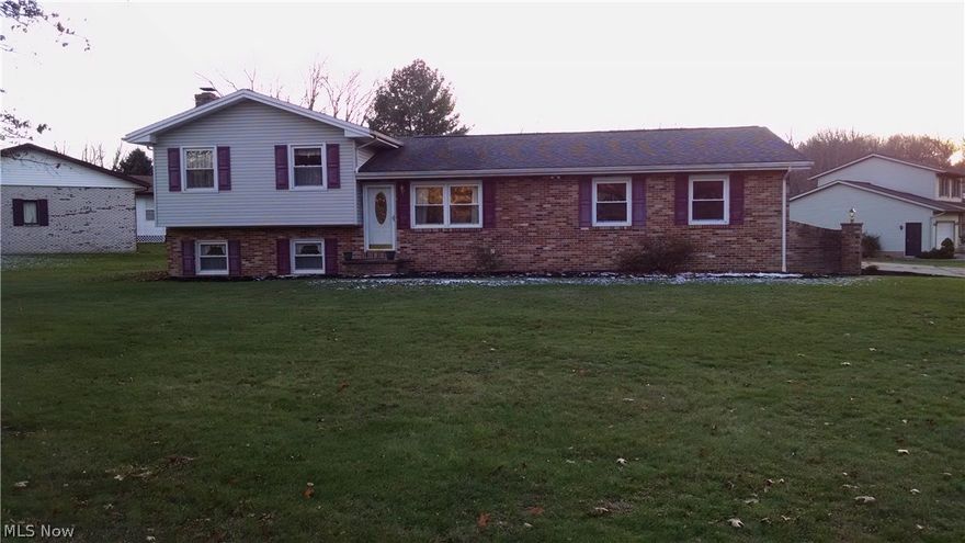 Take a look at this well maintained 4 level split home with 4 bedrooms and 2 full baths.  This home features updated windows and siding.  The home has a family room on the lower level with a wood burning fireplace and full bath.  Also on the lower level there is a 4th bedroom that could be used as a home office with a separate outside entrance. Home has plenty of storage in the unfinished 13 course basement.  Home also features an attached 2 car garage with water and electric.  All this on a corner lot in a quiet neighborhood.