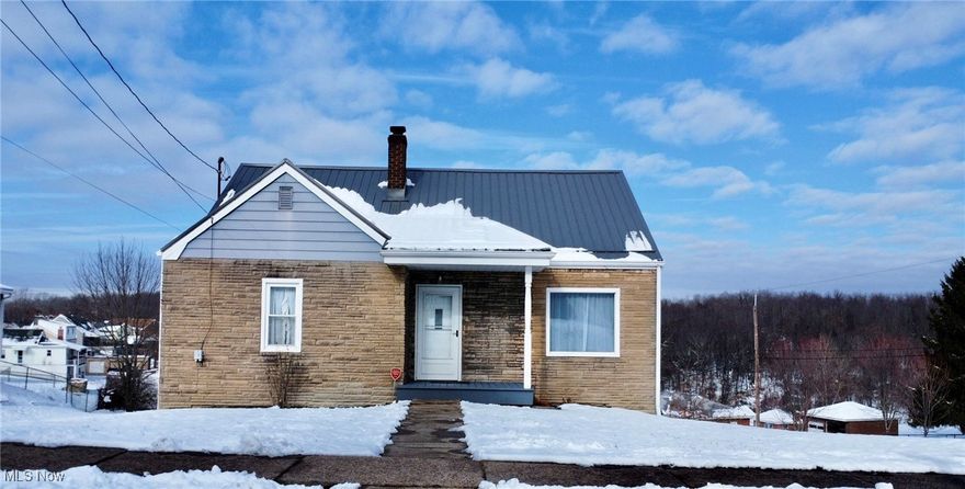 Looking for a move-in-ready home in Weirton? This updated 2-bedroom, 1-bath sits on a beautiful corner lot and features a new metal roof, fresh flooring and freshly painted rooms throughout. With a new garage door opener and plenty of outdoor space to enjoy, this home is ready for its next owner. Don’t wait — schedule a tour with your favorite agent today!