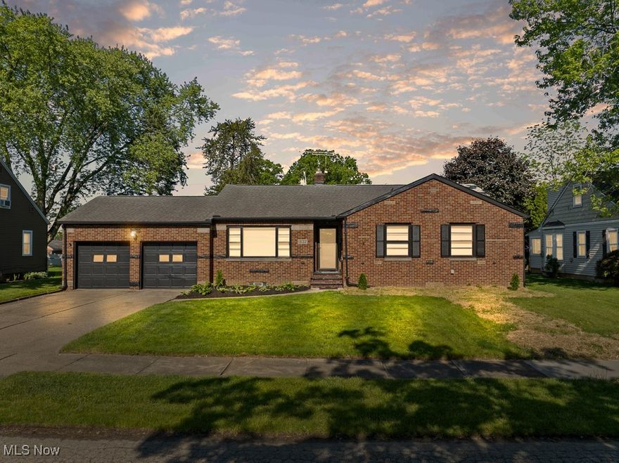 Welcome to this well-maintained brick ranch featuring easy-care landscaping and a two-car attached garage, complete with matching shutters for a cohesive look. This home offers 3 comfortable bedrooms and 2 full baths, ideal for those seeking both style and functionality. Inside is a warm and inviting living room, highlighted by a large front window that fills the space with natural light. Flowing seamlessly from the living area is a dining space adorned with beautiful hardwood floors, perfect for entertaining.
The large kitchen is a standout, offering built-in shelving, generous storage, and room to create your culinary favorites. The spacious owner’s suite provides a peaceful retreat, featuring a charming retro-style bathroom with a stand-up shower. Two additional bedrooms and another retro tiled full bath complete the main level. Downstairs, a full basement expands your living possibilities with room for a recreation area, hobby space, and a dedicated laundry room. Need even more room to relax or host? The sunroom with a stylish plank ceiling that accentuates the brick walls provides the perfect setting for gatherings year-round.
Outdoors, enjoy a private patio ideal for summer cookouts and a handy storage shed to keep everything organized. With its blend of vintage charm and thoughtful updates, this home is move-in ready and waiting for you!