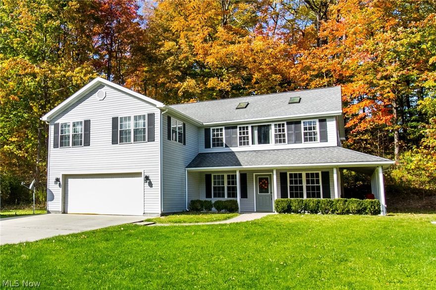 House totally renovated down to the studs in 2005. True raised ranch with open concept on main level.  Enjoy the privacy on this 8.75 acre lot with just under 2500 square feet of living space.  You heard that right almost 9 acres in the heart of Concord Township. 3 bedrooms including an owner suite with spa tub with goose neck faucet, separate shower, double sink vanity with wall mirrors.  Cherry kitchen with loads of cabinets, open to living room and dining room that leads to deck.  Lower level has a family/media room, huge work shop with full bath and access to garage or outside.  Don't miss being able to hunt, snow mobile, and drive an ATV on your​​‌​​​​‌​‌​​​‌‌​​​‌‌‌​​‌​​‌‌​​​​ property.