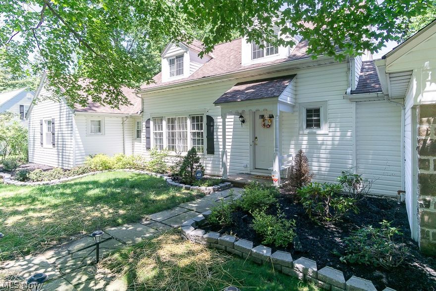 Move right into this gorgeously updated Cape Cod located in a desirable neighborhood in Lyndhurst. This home offers stylish charm accented by hardwood floors and fresh décor throughout. The spacious living room invites you in with a lovely fireplace and a large picture window framing the front yard. The renovated kitchen features stainless steel appliances, granite counters, antique-glazed cabinetry, and a breakfast bar opening up from the dining room. The first floor master bedroom offers a spacious ensuite bathroom and walk-in closet that could be converted back into an additional fourth bedroom. A sun room/family room can also be found on the first floor. Upstairs, you will find two more bedrooms and a beautifully updated hall bathroom. The lower level level is partially finished into a recreation room, while the unfinished area has a laundry/utility area. Outside, the back patio overlooks a large and private back yard with a storage shed. This home offers a fantastic location, situ