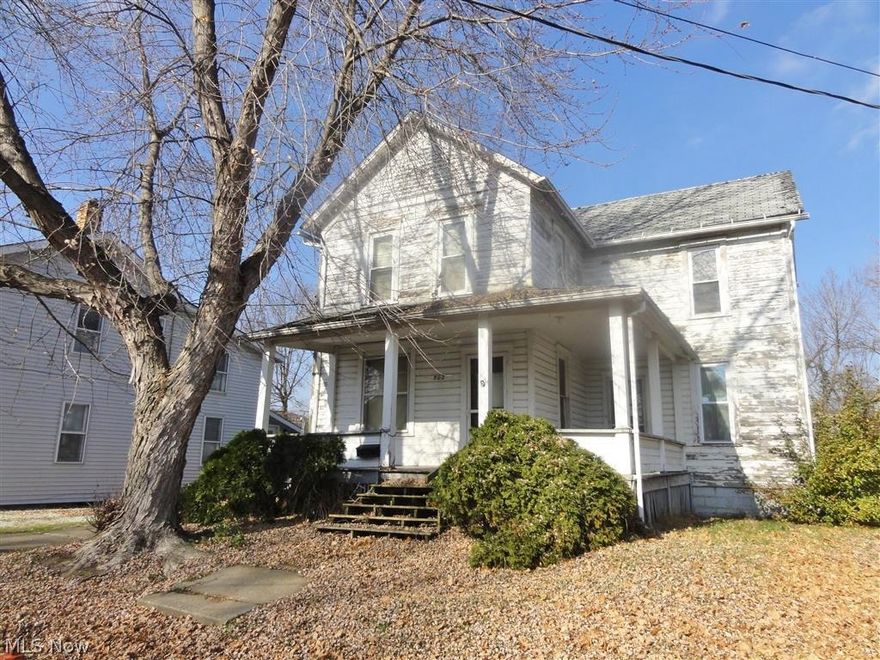 1,544 sf, 2-story home with wrap-around porch in Minerva. Large kitchen. Dining room. Upstairs has two bedrooms with a large bonus room. Large master bedroom with double closets. Two full bathrooms. One on the first floor and one on the second floor. Would make a great rental property. Storage shed. Sold "as is".