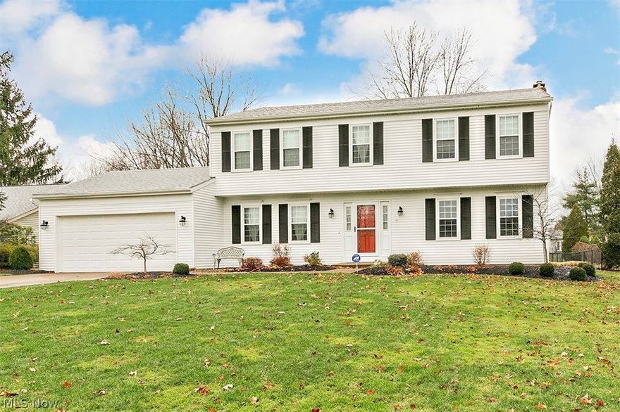 Move right into this beautiful colonial located in Solon's highly desirable location of Arthur Meadows subdivision! Meticulously well maintained and cared for gorgeous landscaped lot! Recent updates include NEW hardwood floors, porcelain tiled floors, & windows throughout! Neutral painted walls, trim work & window treatments throughout! Front foyer features porcelain tile floors which continue into the kitchen and  back hallway to garage entry. 1st floor laundry & half bath. Dining room and living room with hardwood floors, chair railing, wainscoting, & beautiful wood trim moldings! Newer custom designed wood French doors close off and opens to family room! Kitchen includes wood cabinets, desk area, extended counter space & all appliances! Newer slider leads off the eat in area to NEW fabulous brick patio for relaxing and enjoying an amazing private back yard! Family room opens off kitchen featuring a wood burning fireplace, chair railing, & large window. Upstairs large hallway with si
