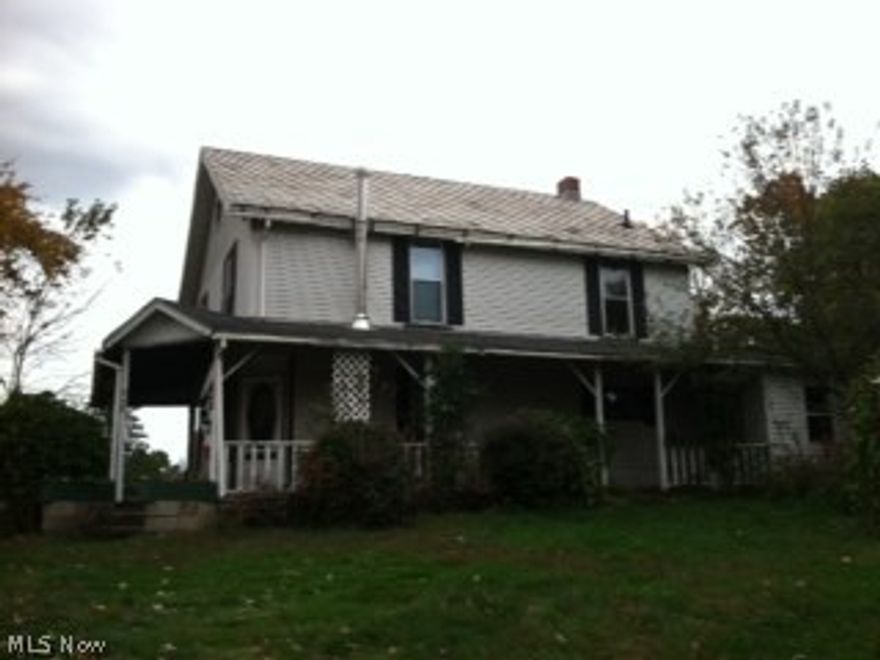 Large two-story farmhouse and several outbuildings sitting on approximately 10 acres of land in Greene Township. Sold as-is  Two parcels totaling approximately 10 acres. Both parcels are included in the sale.