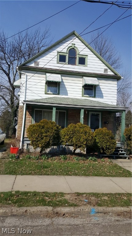 With a little elbow grease this house could be a tremendous home. Very solid in structure! The back deck overlooks Edgewood park a staple on the West-side of Barberton. This home is a potential 3, or 4 bedroom.There is a 2nd kitchen on the 2nd floor, originally it was a 3rd bedroom and could be converted back to a bedroom. The attic could be converted into a possible 4th bedroom. This home features a newer 90 + furnace, and a newer H.W tank. Take the time out to see this one!