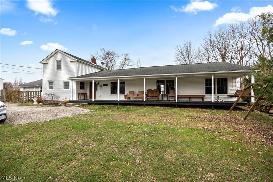 Welcome to this beautifully updated Cape Cod-style home set on a spacious 1-acre lot, offering a rare combination of charm, versatility, and opportunity with RB1 zoning—perfect for residential living or potential commercial use. A long, covered front porch creates inviting curb appeal and the perfect place to relax and unwind. Inside, you’ll find an open-concept layout designed for both everyday living and entertaining. Fully remodeled in 2023, the kitchen stands out with striking blue cabinetry, granite countertops, a large center island, stainless steel appliances (all included), and warm wood flooring that flows seamlessly into the expansive great room. The great room features soaring vaulted ceilings, fresh neutral paint, creating a bright and welcoming space. The oversized, main floor master suite, offers comfort and privacy with fresh paint and durable vinyl flooring. Just off the main living area, you’ll find a full bathroom with a step-in shower and a spacious laundry closet with a stylish barn door, along with a washer and dryer installed just two years ago. The upstairs includes two generously sized bedrooms, a full bathroom, and brand-new carpeting throughout. A freshly painted partial basement provides additional storage space and features a brand new furnace with a transferable warranty. Outside, enjoy a fully fenced yard, a deck ideal for entertaining, a storage shed, and additional garage storage. Major exterior updates—including the roof, siding, and front porch—were completed approximately 10 years ago, offering added peace of mind.
This unique property combines classic Cape Cod charm with modern updates, flexible zoning, and plenty of indoor and outdoor space. A rare opportunity you won’t want to miss—being sold as-is.