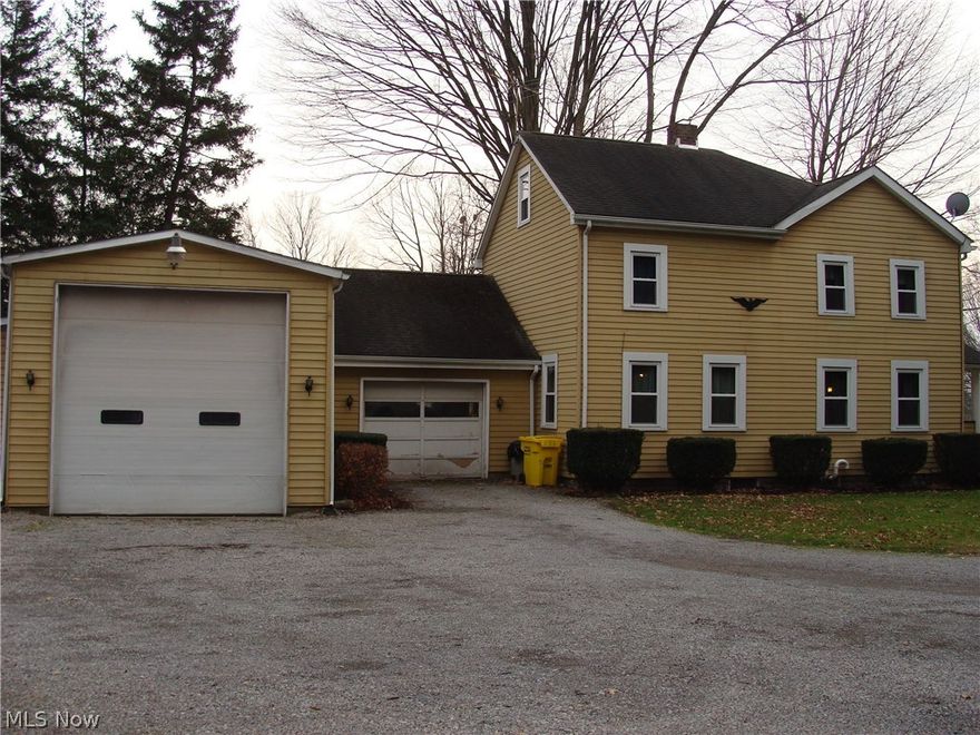 MAKE AN OFFER - OWNERS RELOCATING  3 Bedrooms, ample sized kitchen, dining & living room.  200 AMP electric, newer furnace & windows.  Redone front porch, fenced in back yard.  1 car attached garage and 24 x 40 attached over sized garage.  All on half acres w/a lot of parking.  Kitchen appliances stay.  COME SEE