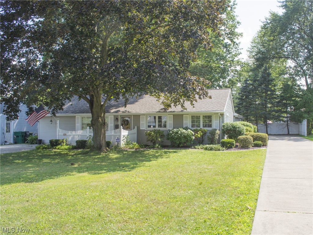 Spectacular ranch home in move-in condition. Major addition and renovation (approx. 2000), includes dream master bedroom suite with full bath and vanity area, designer kitchen with granite, dining room, living with hardwood flooring. Also, a 24x23 heated garage with an extra driveway, pebble stone finish on patios and garage, fenced yard and much more. Updated windows and roof shingles. One year paid home warranty included.
