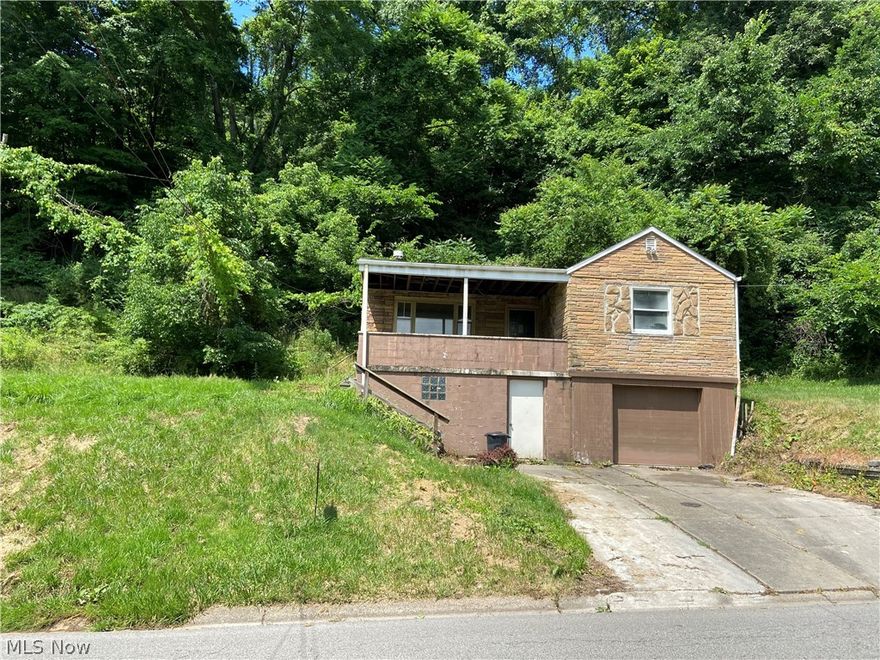 SAY HELLO TO A GOOD BUY!  Fix and save or invest for your future with rentals!  3 bedroom, 1 bath ranch home situated on 3 lots (.4 acre) in Weirton!  1 car garage and gas heat.  Move fast before it's gone!