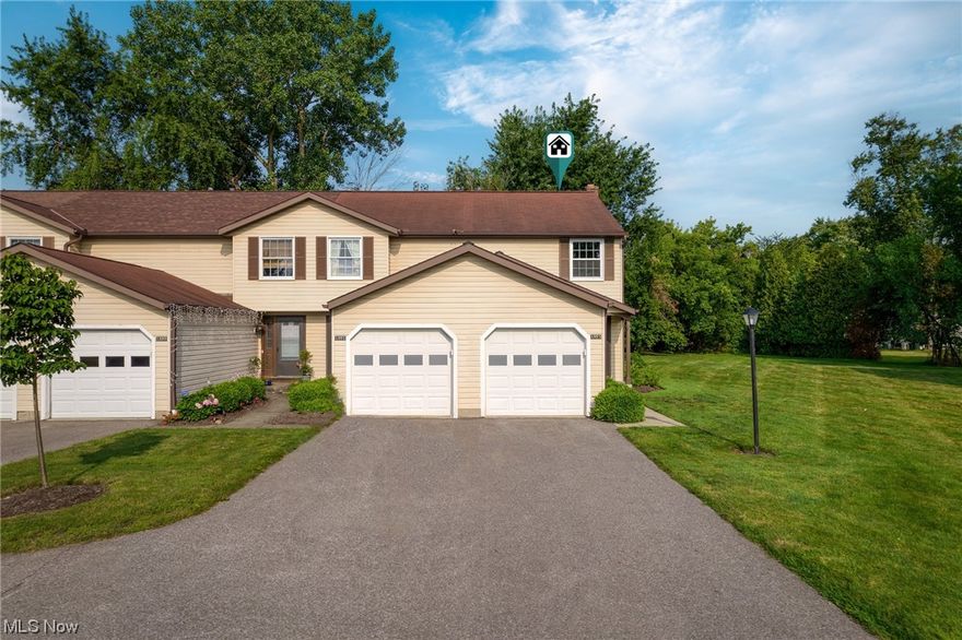 Looking for your first home or to downsize? Then this cozy condo is for you! Totally renovated in 2018, this end-unit townhome has extra side yard space and a wooded backyard to enjoy. The spacious living room includes recessed lighting that gives the area a bright and airy feeling. It also features a woodburning fireplace with patio doors that lead out to a private fenced-in patio. Stainless steel appliances, granite countertops, soft-close drawers and a breakfast bar complete the kitchen. A conveniently located half bath on the main level will make your guests happy! Upstairs are two spacious bedrooms with ceiling fans along with the main bath. Both baths include soft-close vanity drawers and toilet seats. You will be pleasantly surprised with the extra living space on the lower level with a fully finished basement and a laundry area. Recent updates include: New Carrier Central Air Unit (2019), New Front Storm Door (2020) New Vinyl Windows in Upstairs Bedrooms (2023). Close to shoppi