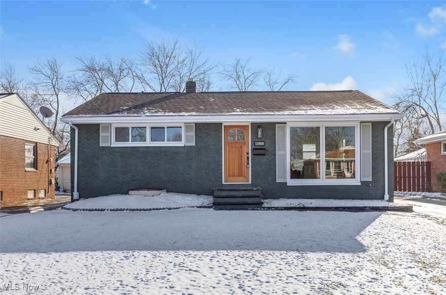 Welcome to your dream home! This fully updated ranch-style home is truly move-in ready and designed for comfortable, modern living. Step inside this 4-bedroom home and enjoy a space that feels brand new from top to bottom. The inviting living room features a large front picture window that floods the space with natural light and showcases the clean, contemporary finishes throughout. The updated kitchen is a standout, offering white shaker-style cabinetry, brand-new stainless steel appliances, granite countertops, and a stylish tile backsplash that adds a timeless touch. It’s a perfect balance of beauty and everyday functionality. On the main level, you’ll find three well-sized bedrooms with generous closet space and a fully updated bathroom featuring modern fixtures and finishes. The finished lower level expands your living space with a large recreation room, an additional full bath, and a spacious fourth bedroom complete with a deep closet and a newly installed, city-permitted egress window that brings in abundant natural light. Whether used as a guest suite, home office, or private retreat, this level offers excellent flexibility. A dedicated laundry and storage area completes the space. Outside, enjoy the spacious backyard—ideal for entertaining, play, or pets—along with a detached two-car garage. Recent updates include new roof, windows, and hot water tank. Newer central air conditioner, updated plumbing and electrical, and new interior room doors, making this home truly turnkey. Conveniently located near parks, schools, shopping, and restaurants, this Maple Heights gem is a rare find. Schedule your showing today!