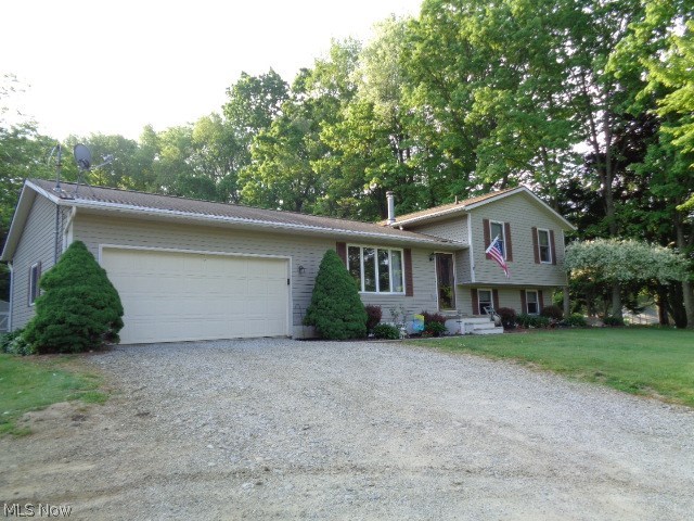 Welcome home to 2115 Canton Road, Akron, OH 44312! This lovely home is newer but has been well maintained by the original owners! You'll enjoy peaceful setting with gorgeous views. Home features x-large eat-in kitchen, 3 large bedrooms and rec room along with an office in the lower level. This 4 level split also offers additional storage in the 4th level basement!