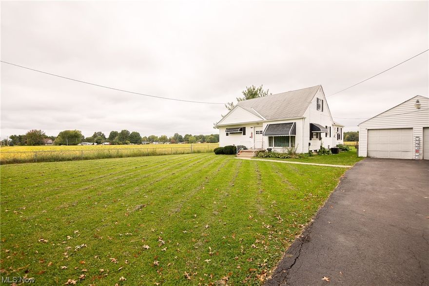 This 3-bedroom, 1-bath Cape Cod home offers a comfortable and inviting living experience. With hardwood flooring, a versatile lower level, a spacious kitchen with a connected dining room, a detached garage providing secure storage for your vehicles and additional space for hobbies or projects, and a large backyard which offers tranquility and privacy with no homes located behind the property. Whether you dream of gardening, outdoor play, or hosting al fresco gatherings, this backyard is a canvas for your imagination., it provides the ideal setting for creating cherished memories and enjoying the serene surroundings of the Midview school system. Don't miss the opportunity to make this house your forever home.