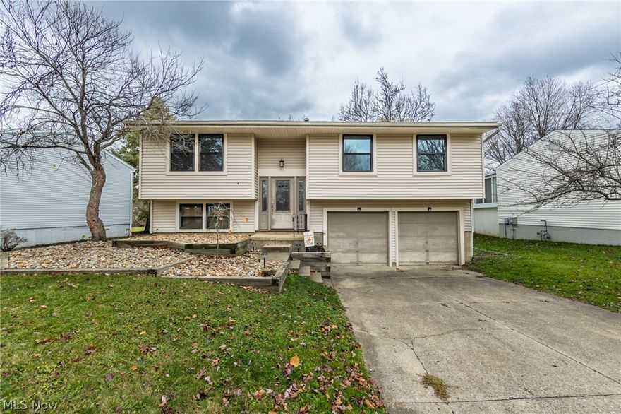 A wonderful Kent bi-level with 3 bedrooms and 2 FULL baths.  With an updated eat-in kitchen, this home also features a 14x14 Sun Room off the dining area.  The bathrooms are updated, and the bedrooms are spacious.  An open living room is large.  The lower level has a 23x12 family room, full bath, and laundry room.  A wonderful back yard extends to a creek, a 2 car garage, deck, and so much more.