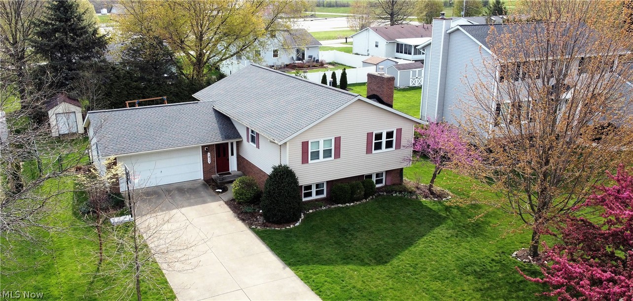 Welcome to this charming three bedroom, two and half bath split level home. Come on into the large inviting foyer up to the open floor plan offering the living room, dining room, and kitchen. The dining room offers a slider door which allows natural light to shine through and leads out to the large deck to enjoy or for entertaining. The open, bright and classy remodeled kitchen (2019) has an abundance of cabinets, counterspace, new dishwasher, new oven, new microwave. There are three bedrooms on the main level and a fully remodeled bathroom (2020-2021). The master suite has a fully remodeled bathroom (2020-2021). In the lower level you will find a comfortable and warm feeling finished family room with gas fireplace, half bath, finished office area (2019), just so much room for entertaining, enjoying movie night etc., plenty of storage and laundry area. The beautiful large fenced in backyard has a patio space, deck, storage shed for all those outside tools. There is a two car attached