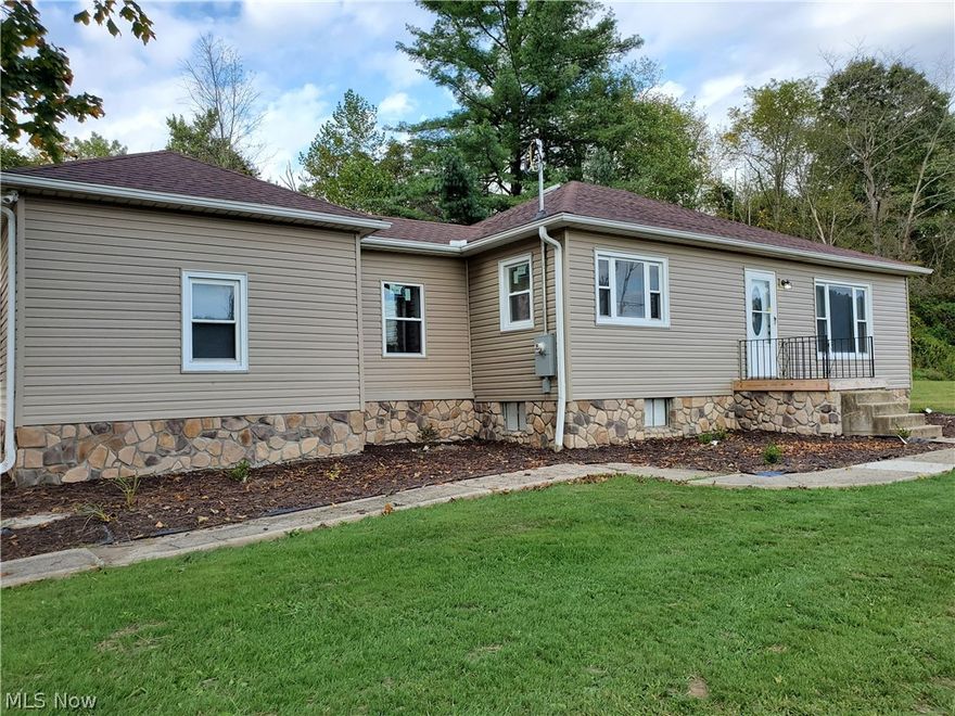 Take a look at this ranch home remodeled inside and out! This home currently offers 2 bedrooms and a laundry on the main floor, which could be converted back into a 3 bedroom easily. There is also a great breezeway area, one car attached garage, large living room, and an awesome 40x30 detached garage for plenty of work space or even to rent out if not needed. New roof, siding, furnace, flooring, paint, windows, garage door, concrete floor in garage, landscaping and more. Located in Rolling Hills School District and just 2 miles from Byesville and I-70 this home offers a great location and is MOVE IN READY!