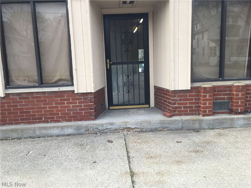 Commercial space located in strip mall corner of W Waterloo and 2th in Kenmore. Space ready to be made into your desired business location. Space is basically a shell waiting for creativity and small business entrepreneur.  Building is professionally managed.  Shared parking area in front and back of building. Signage space is available. Space included restroom, large open floor plan to be designed by tenant for business needs, two large picture display windows in front, a back entrance, and large unfinished basement. Recent use was heating a cooling company.