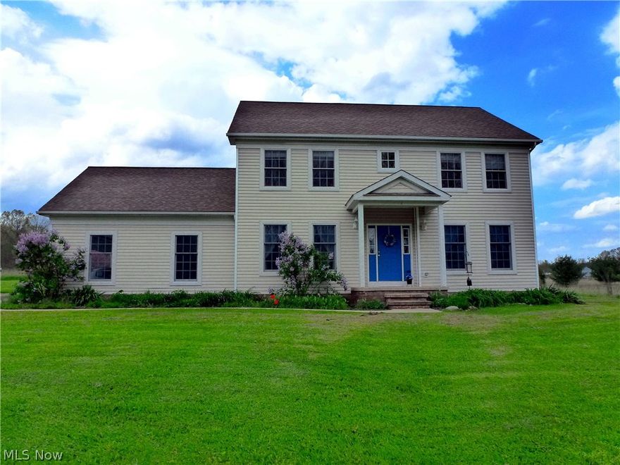 Invisible from the street and set back almost 400' from the road you'll find this pristine Original Owner Custom Built home surrounded by idyllic privacy and a meandering creek that will not change! Looking for peace and tranquility--YOU JUST FOUND IT!! A covered front porch leads into the 2 Story Foyer with a Formal Dining Room with Tray Ceiling to the left and to the right the Living Room with Fireplace with both rooms leading to the rear of the home. An Eat-in Kitchen with island, Oak Cabinets and tile floor spans the rear of the home and into a Sun Room with tile floor and wall of windows and Sliding Door to a 320 Sq. Ft. wrap around Deck.  What a great place to start or finish your day! Entry from the enlarged 23' x 21' garage with water, floor drain and service door to rear yard provides easy access to a half bath and Mud Room. Upstairs are 4 spacious bedrooms including the Master Bedroom with Tray Ceiling and private bath and the main bath serving the remaining bedrooms. You'll