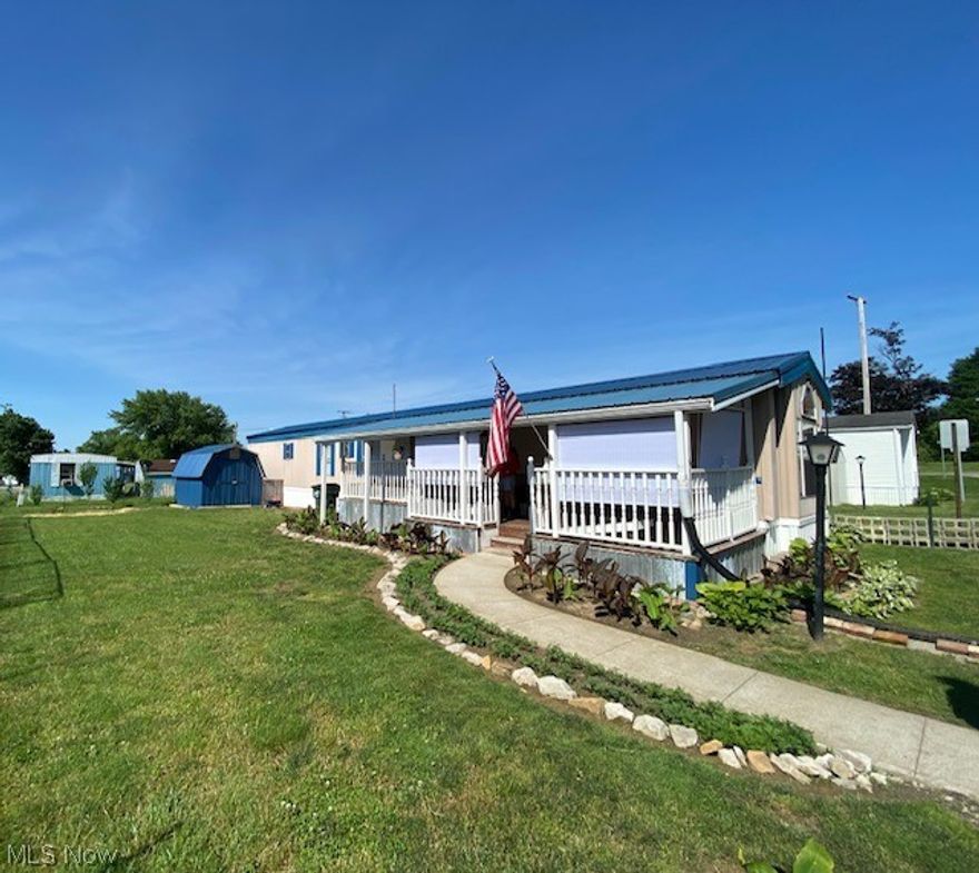 Conveniently located 1 minute from Maysville Pike a very well maintained 1988 mobile home with a beautifully landscaped yard. This charming home is ready to move into with no work needed. This is a possible 3 bedroom with extra large living room and very modern kitchen featuring tinted windows, decorative hooded light features in the kitchen, and fully furnished with appliances. Spacious deck to gather with family and friends while maintaining privacy.