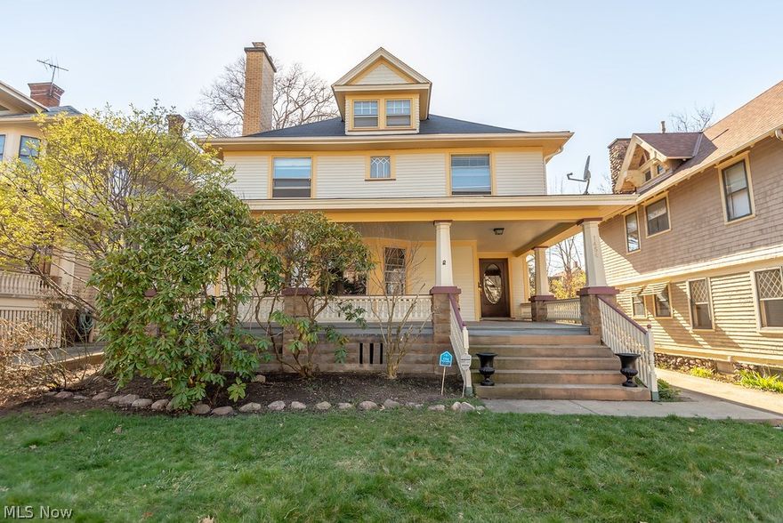 Don't miss this grand historic Lakewood Colonial with exquisite period charm.   Beautiful hardwood floors, large wood trim and some leaded glass windows 
throughout this home.  Large formal living room with beautiful fireplace accented by crown molding with wood pillar arch way.  The home is graced by a massive formal dining room with molded wood panel on lower area of the walls.  Recently renovated Industrial Chef kitchen with butler pantry and stainless steel appliances.  The second floor has 4 large bedrooms and the main bath for the home that features tiled shower and claw tub.  Third floor has a loft and a office/fifth bedroom.  Enjoy summer nights on the large front porch.  This home also has a two car detached garage.  Close to downtown Lakewood shopping and restaurant district.  Call now for your private showing.