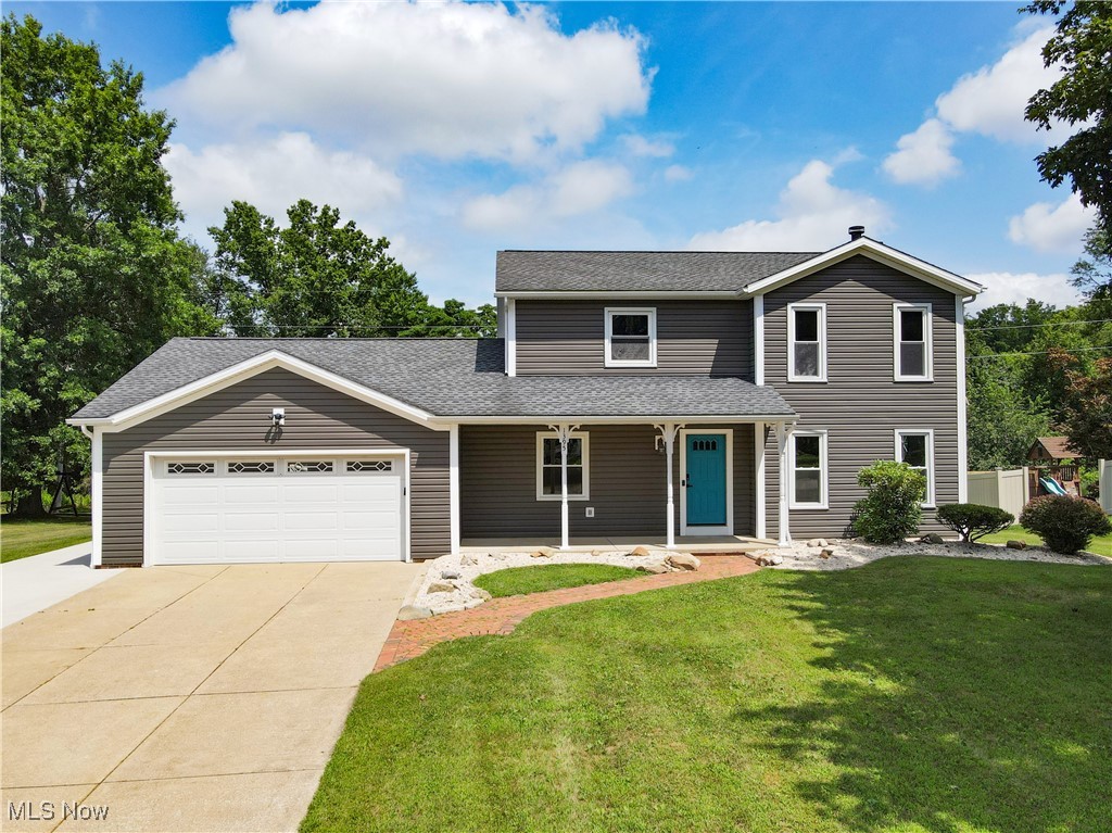 Fabulous colonial in Green with 3/4 beds and 3.5 baths on almost 1/2 acre. This home has been completely updated! Welcoming front porch opens to foyer flanked by the dining room and spacious great room with gas fireplace. The kitchen is brand new with stunning cabinetry, SS appliances, quartz countertops and stylish backsplash. The dinette opens to multi-level deck with Trex finishes, newer above ground pool (2021) and large backyard with shed (2023). Off the kitchen is a dining room, half bath and convenient first floor laundry/mudroom with exterior door to deck and pool. The vaulted primary bedroom includes an en-suite bath with tub/shower combo and walk-in closet. Two additional bedrooms and renovated full bath with tall soaking tub compete the second floor. The walk-out lower level is a perfect option for in-law or teen suite with recreation room, full bathroom with new finishes and a possible 4th bedroom/office. The 2+ car garage is heated and is extra deep on one side for storage. Additional improvements include vinyl siding and windows 2020, Furnace/AC 2020, additional concrete to driveway and patio 2023, LVT flooring 2025 and newer carpeting. Green Schools! Home warranty included! Move in and enjoy!