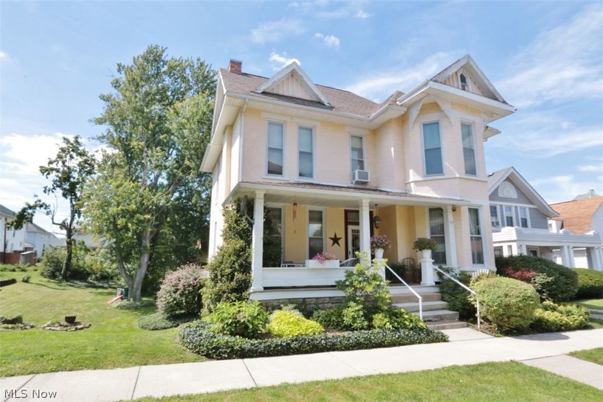 Step inside this classic Victorian era home where craftsmanship is evident throughout. You will find historical features, including a lovely foyer-hall area leading to a graceful ascending staircase, gleaming hardwood floors throughout most of the home, gorgeous wood staircase, lofty ceilings, double French doors and transom windows. If you desire a well maintained home with generous room dimensions and many updates, look no further. All bedrooms are of gracious size with plenty of closet space. A second floor storage room is ideal for all those extras. A wood burner is in the family room (owner has not used it). Laundry room has built in storage. Driveway is shared with neighbor and leads to the backyard, brick patio and an older, but roomy garage. Delight in this historical treasure that was built in a different era, but has maintained its integrity, character and ambiance. Hot water heater is rented. Upstairs curtains do not stay. One half undivided interest of neighboring lot is 20