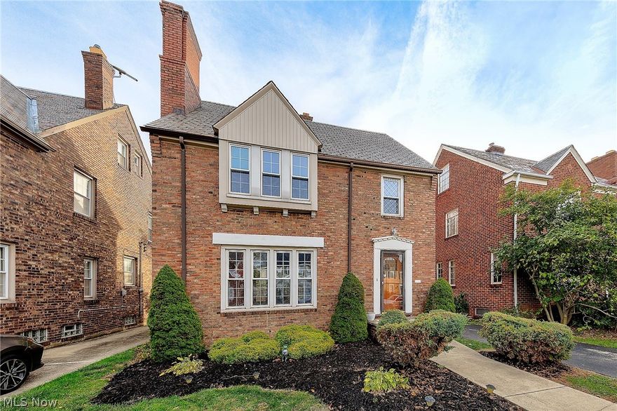 Move right in to this spectacular brick colonial that has been remodeled from top to bottom! Spacious living room with fireplace. Entertain dinner guests in the formal dining area. Completely updated eat-in kitchen with new cabinetry, custom tiled backsplash, granite countertops, and new appliances. Half bath on first floor. Master suite on the second floor has been freshly painted and in-suite full bath has been renovated. Two additional bedrooms and an additional updated full bath complete the second floor.  The fully finished third floor is ideal teen suite, featuring fourth bedroom and new full bath. Lower level rec room with new carpet! Enclosed porch leads to deck overlooking landscaped yard.  Two car garage! Slate roof, most of the windows are newer, freshly painted throughout, hardwood floors throughout have been refinished. Close to universities, hospitals, and colleges. Minutes from shopping and restaurants. Welcome Home! Call for a private showing today!