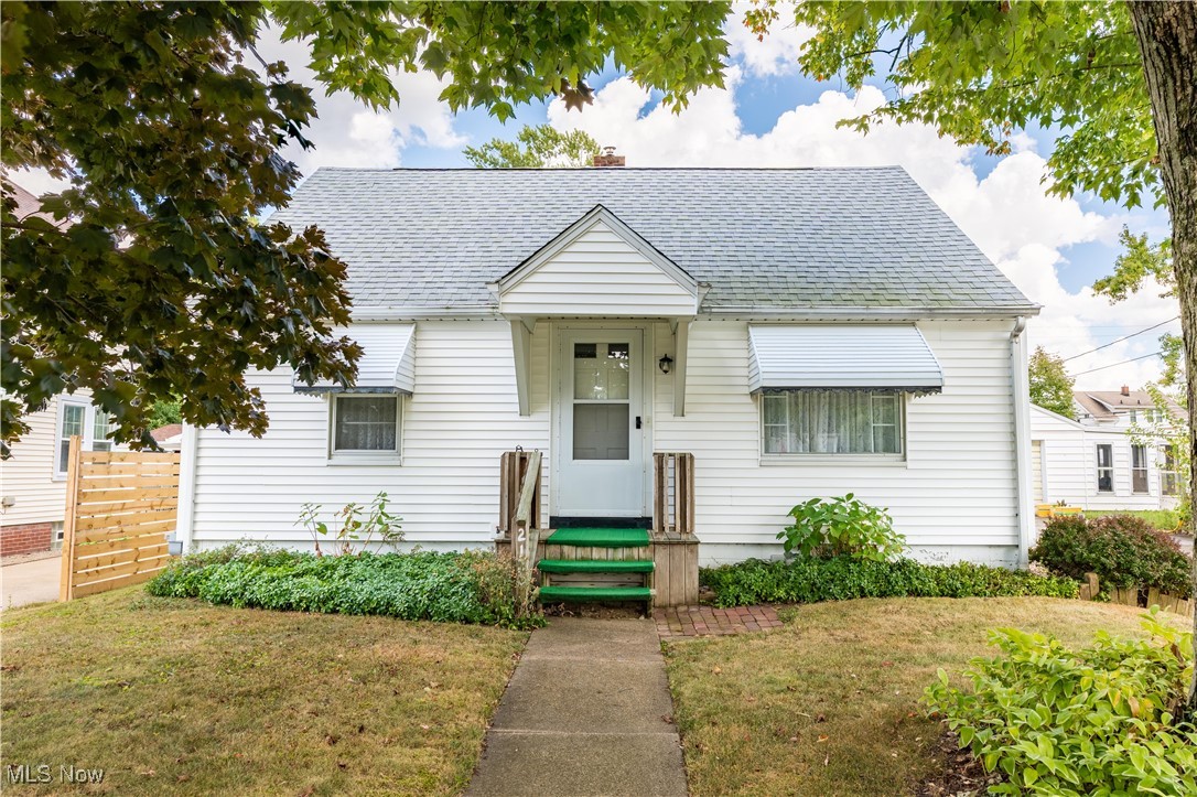 This charming bungalow is a gem you won’t want to miss! The inviting front porch welcomes you into a home filled with charm and character. The great room offers plenty of space and an abundance of natural light from the large windows. Adjacent to the great room, you’ll find two generously sized bedrooms with ample closet space, a full bathroom featuring a tiled tub-shower combo with updated lighting. The eat-in kitchen is perfect for gathering with loved ones, offering white cabinets, serene views of the backyard, and a Dutch door great for keeping pets or kids inside while letting fresh air in. The expansive third bedroom upstairs includes a deep (13x5) closet, built-in shelving, and additional storage, making it versatile. The unfinished basement features a laundry area and additional storage space. Step outside to enjoy the relaxing backyard with a fenced-in area with a lattice-covered sitting area, ideal for spending time outside. The 1-car detached garage completes the package. Some recent updates include a new roof, furnace, and AC. This home is conveniently located near shopping and restaurants. Schedule your private showing today and see all this charming home has to offer!