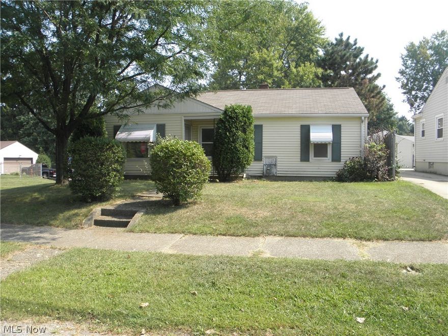 Nicely updated ranch with newer white kitchen cabinets, eating area between kitchen and living room. New carpet in every room! Three carpeted bedrooms all with ceiling fans. The master bedroom has a door to the rear patio. There's a nice enclosed rear porch, and concrete between house and garage. The yard beyond the garage is all fenced in. Seller is motivated and will assist with closing costs. The property is also listed for rent and could rent out soon. Seller might consider a lease/option.